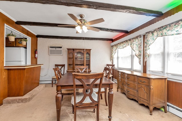 475 Emerson St, Uniondale, NY 11553 - dining room featuring a baseboard radiator, ornamental molding, light carpet, an AC wall unit, and a ceiling fan