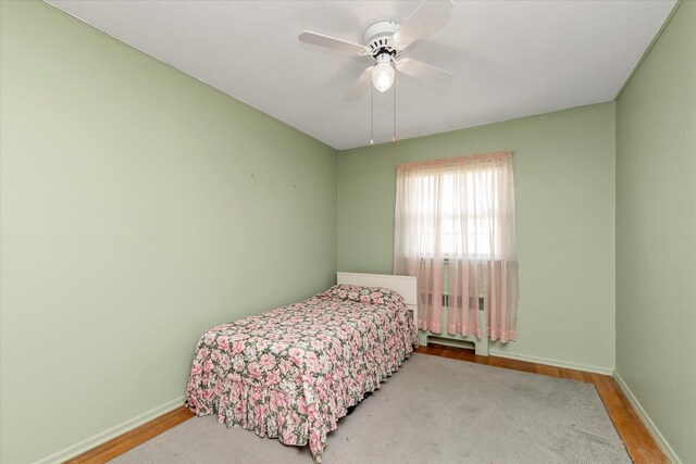 475 Emerson St, Uniondale, NY 11553 - bedroom featuring wood finished floors and a ceiling fan