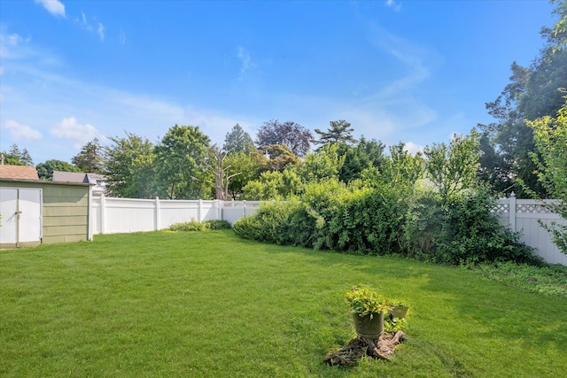 475 Emerson St, Uniondale, NY 11553 - fenced backyard with a storage shed