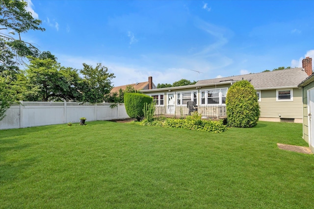 475 Emerson St, Uniondale, NY 11553 - rear view of house with a chimney