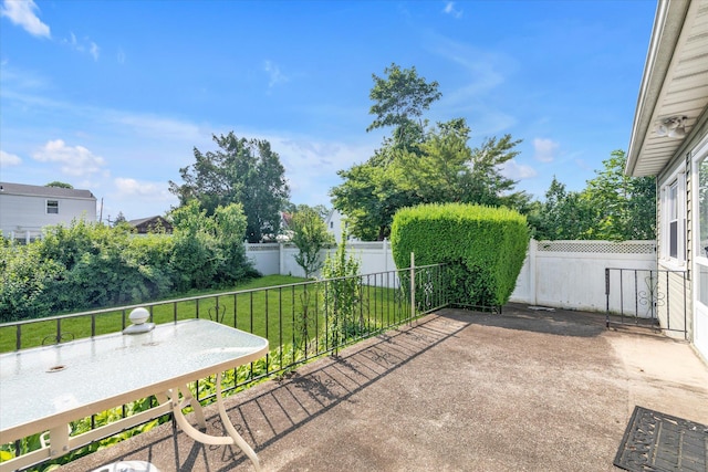 475 Emerson St, Uniondale, NY 11553 - fenced backyard with a patio area