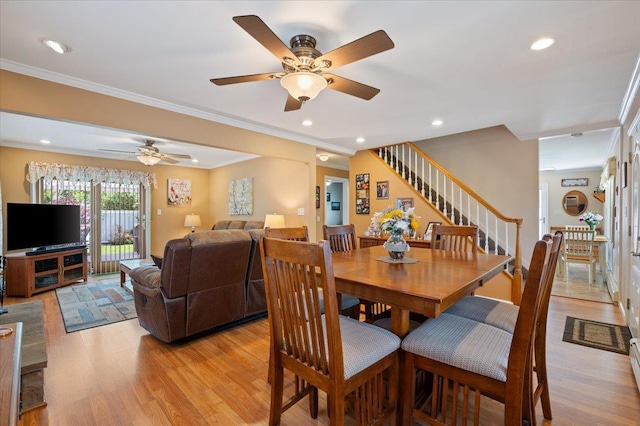 37 Swan Ln, Levittown, NY 11756 - dining room with stairway, light wood-style flooring, a ceiling fan, recessed lighting, and crown molding