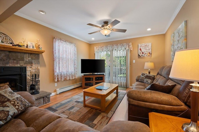 37 Swan Ln, Levittown, NY 11756 - living room featuring baseboard heating, a ceiling fan, wood finished floors, recessed lighting, and ornamental molding