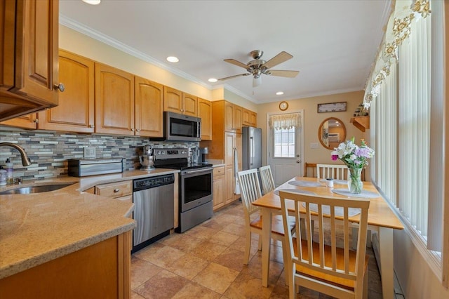 37 Swan Ln, Levittown, NY 11756 - kitchen with appliances with stainless steel finishes, backsplash, a ceiling fan, ornamental molding, and recessed lighting