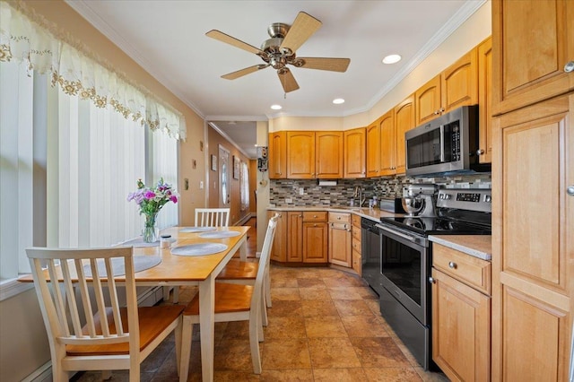 37 Swan Ln, Levittown, NY 11756 - kitchen with appliances with stainless steel finishes, light countertops, a ceiling fan, decorative backsplash, and a baseboard heating unit