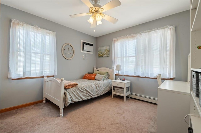 37 Swan Ln, Levittown, NY 11756 - bedroom with baseboard heating, light colored carpet, and ceiling fan