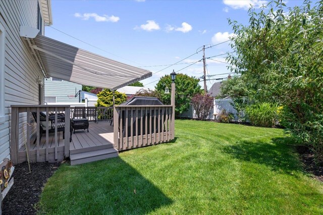37 Swan Ln, Levittown, NY 11756 - view of grassy yard with a deck