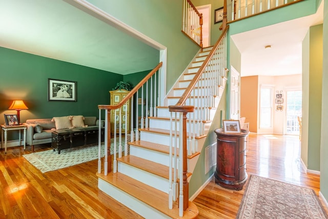 44 Croft Ln, Smithtown, NY 11787 - staircase featuring wood finished floors and baseboards