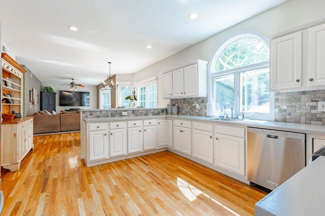 44 Croft Ln, Smithtown, NY 11787 - kitchen featuring stainless steel dishwasher, plenty of natural light, a peninsula, light wood-type flooring, and recessed lighting