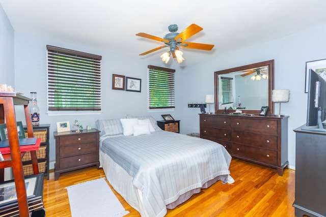 44 Croft Ln, Smithtown, NY 11787 - bedroom featuring light wood finished floors and multiple windows