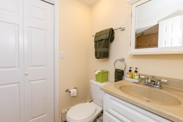 44 Croft Ln, Smithtown, NY 11787 - bathroom featuring vanity, toilet, and a closet