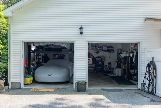 44 Croft Ln, Smithtown, NY 11787 - garage with asphalt driveway