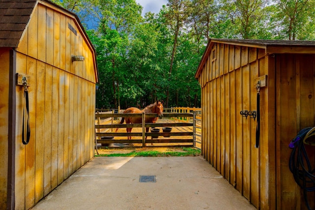 44 Croft Ln, Smithtown, NY 11787 - horse barn featuring view of wooded area