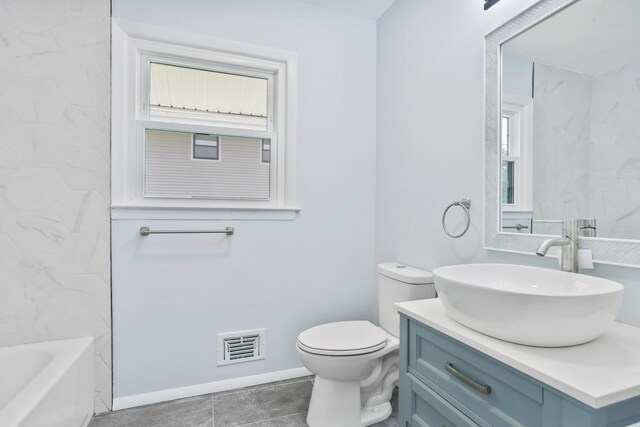 34 Warwick Pl Unit D, Yorktown Heights, NY 10598 - full bath with vanity, toilet, tile patterned flooring, and baseboards