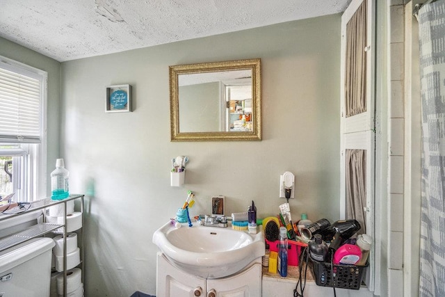 227 N Railroad Ave, Babylon, NY 11702 - full bathroom with vanity and curtained shower