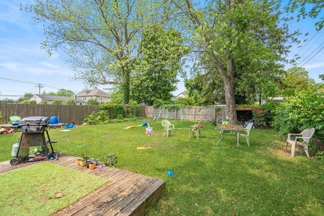 227 N Railroad Ave, Babylon, NY 11702 - fenced backyard featuring a deck
