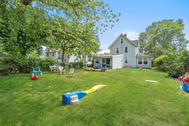 227 N Railroad Ave, Babylon, NY 11702 - view of yard featuring a sunroom