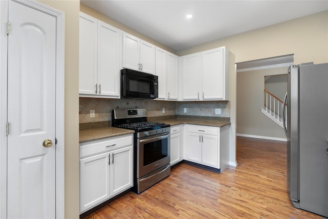 38 Woodside Knolls Dr, Middletown, NY 10940 - kitchen with stainless steel appliances, white cabinetry, tasteful backsplash, and recessed lighting