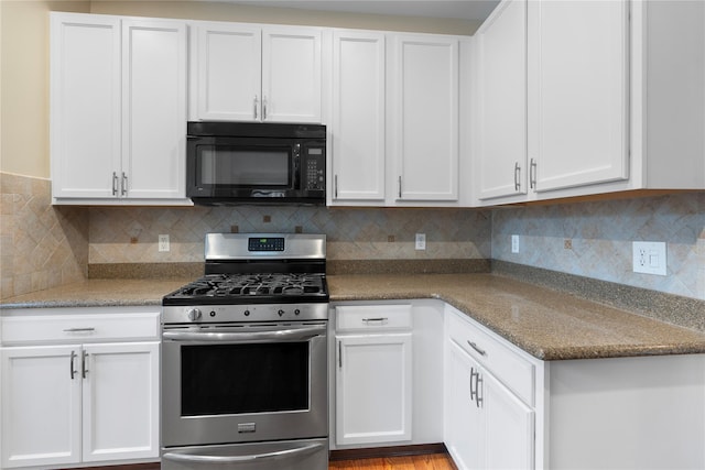38 Woodside Knolls Dr, Middletown, NY 10940 - kitchen featuring black microwave, stainless steel range with gas cooktop, white cabinets, and tasteful backsplash