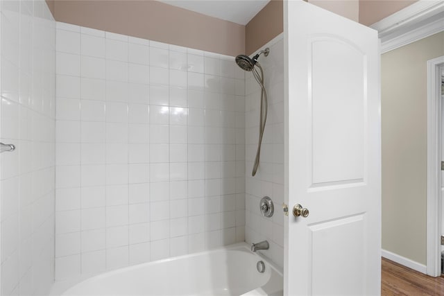 38 Woodside Knolls Dr, Middletown, NY 10940 - bathroom with tub / shower combination and wood finished floors