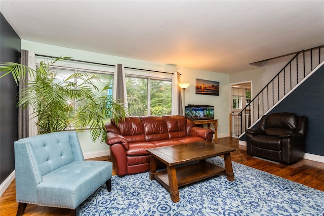 52 Newkirk Rd, Yonkers, NY 10710 - living area with plenty of natural light, stairs, and wood finished floors