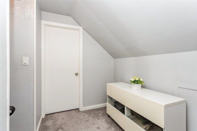 52 Newkirk Rd, Yonkers, NY 10710 - bathroom with vaulted ceiling and baseboards