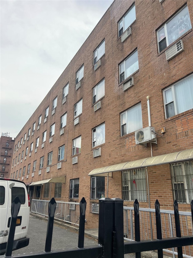 55-05 98th St, Corona, NY 11368 - view of property featuring an AC wall unit