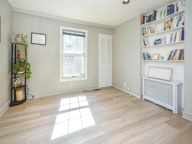 20 Oldwood Rd, Port Washington, NY 11050 - spare room with wood finished floors and baseboards