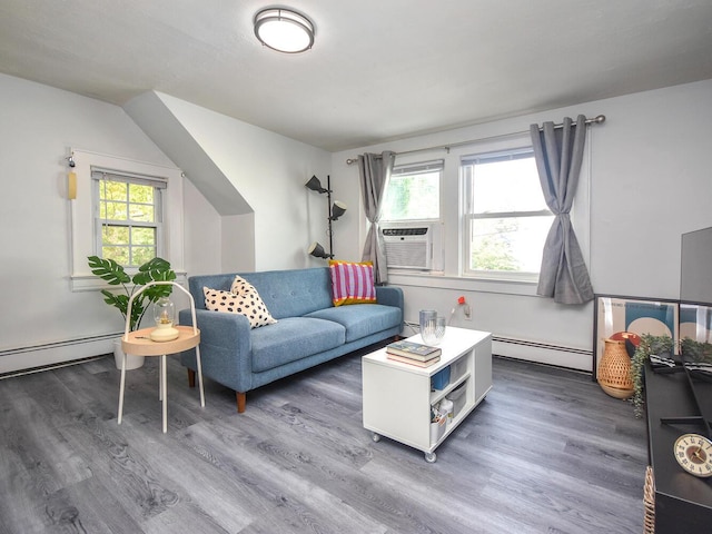20 Oldwood Rd, Port Washington, NY 11050 - living area featuring a baseboard heating unit and wood finished floors