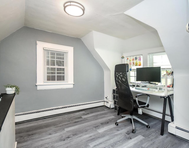 20 Oldwood Rd, Port Washington, NY 11050 - office space featuring wood finished floors, a baseboard heating unit, lofted ceiling, and baseboard heating