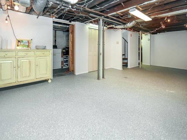 20 Oldwood Rd, Port Washington, NY 11050 - unfinished basement with washer / dryer and stairway