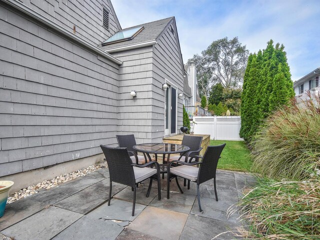 20 Oldwood Rd, Port Washington, NY 11050 - view of patio / terrace with outdoor dining space