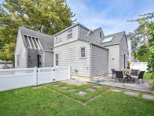 20 Oldwood Rd, Port Washington, NY 11050 - rear view of property featuring a patio, a gate, and roof with shingles