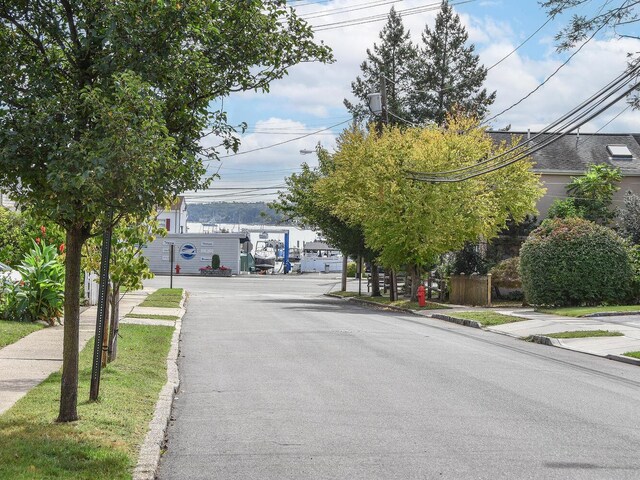 20 Oldwood Rd, Port Washington, NY 11050 - view of asphalt street with curbs and sidewalks