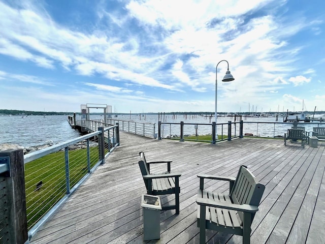 20 Oldwood Rd, Port Washington, NY 11050 - deck with a water view and a boat dock