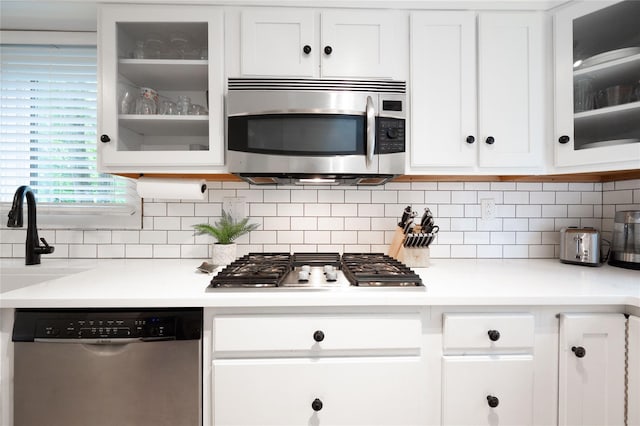 23 Cedar Ledges, Putnam Valley, NY 10579 - kitchen with appliances with stainless steel finishes, white cabinetry, and light countertops