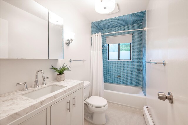 23 Cedar Ledges, Putnam Valley, NY 10579 - full bathroom with toilet, shower / tub combo with curtain, vanity, a baseboard radiator, and tile patterned floors