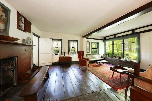 sunroom / solarium featuring healthy amount of natural light