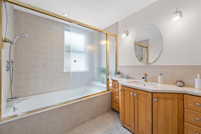 78-32 76th St, Glendale, NY 11385 - bathroom featuring tiled shower / bath combo, vanity, and tile patterned flooring