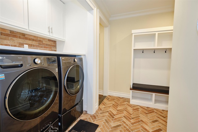 77 Crabapple Rd, Manhasset, NY 11030 - laundry area with separate washer and dryer, brick floors, crown molding, and cabinet space