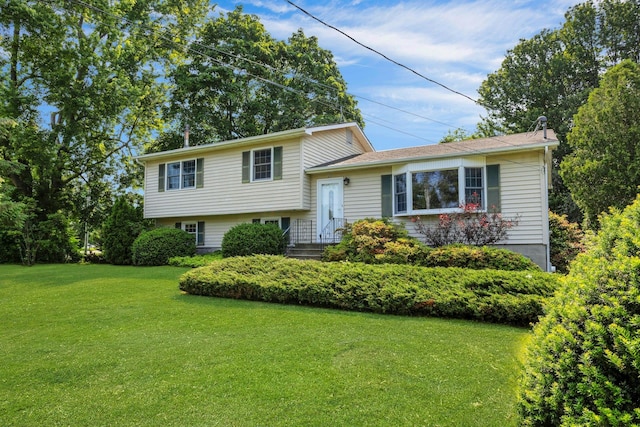 38 Sunset Dr, Brewster, NY 10509 - split level home with a front lawn