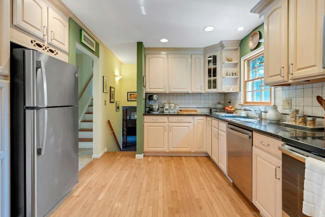 38 Sunset Dr, Brewster, NY 10509 - kitchen featuring appliances with stainless steel finishes, light wood-style flooring, tasteful backsplash, recessed lighting, and open shelves
