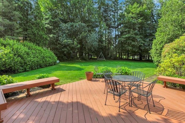 38 Sunset Dr, Brewster, NY 10509 - wooden deck featuring a lawn, outdoor dining space, and view of scattered trees