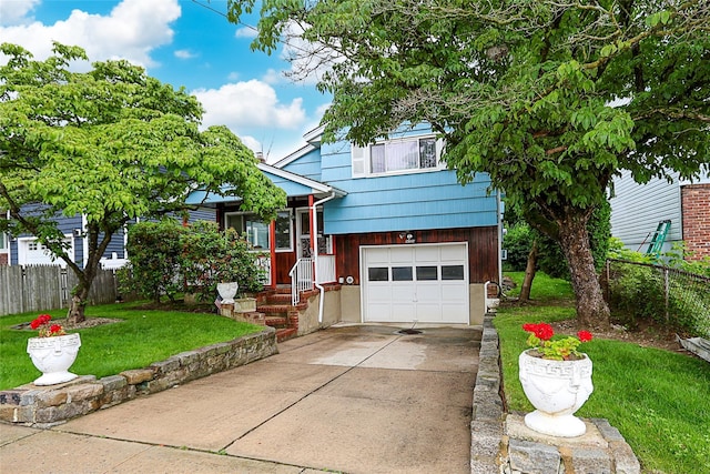 6 Pequot Ave, Port Washington, NY 11050 - split level home featuring a garage and concrete driveway