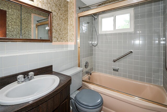 6 Pequot Ave, Port Washington, NY 11050 - full bath with toilet, tub / shower combination, vanity, and tile walls