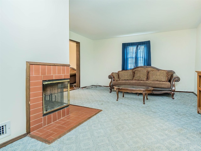 2195 3rd St, East Meadow, NY 11554 - carpeted living room with a tiled fireplace and baseboards