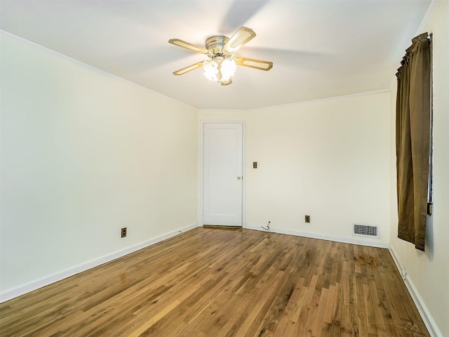 2195 3rd St, East Meadow, NY 11554 - unfurnished room featuring wood finished floors, ceiling fan, and ornamental molding