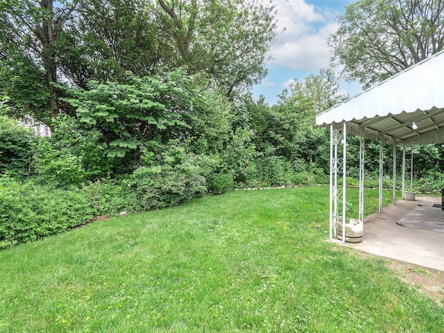 2195 3rd St, East Meadow, NY 11554 - view of green lawn with a patio