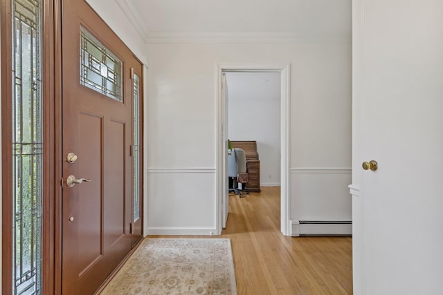 5 Ridgeview Dr, Pleasantville, NY 10570 - foyer featuring baseboard heating, ornamental molding, and light wood finished floors