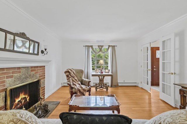 5 Ridgeview Dr, Pleasantville, NY 10570 - living area with crown molding, french doors, light wood-type flooring, and a baseboard heating unit